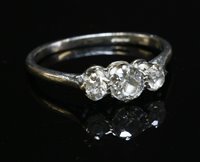 Lot 535 - A graduated three stone diamond ring