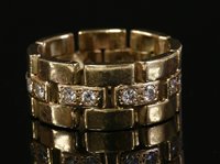 Lot 245 - A gentlemen's diamond set band ring