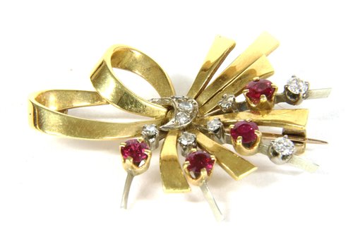 Lot 41 - a gold ruby and diamond brooch