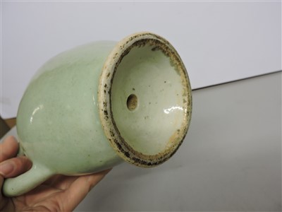 Lot 61 - A Chinese peach shaped Cadogan wine pot