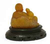 Lot 145 - A Chinese soapstone carving