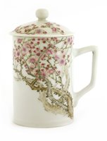 Lot 383 - A Chinese famille rose mug