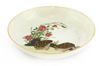 Lot 379 - A Chinese famille rose saucer