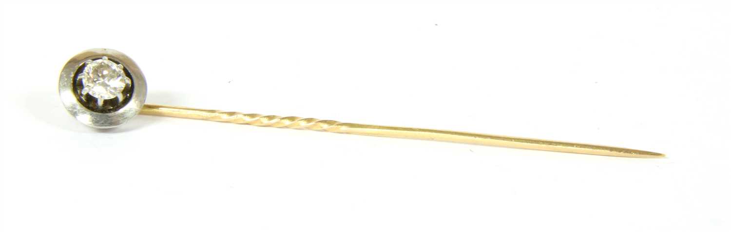 Lot 25 - An Art Deco single stone diamond stick pin