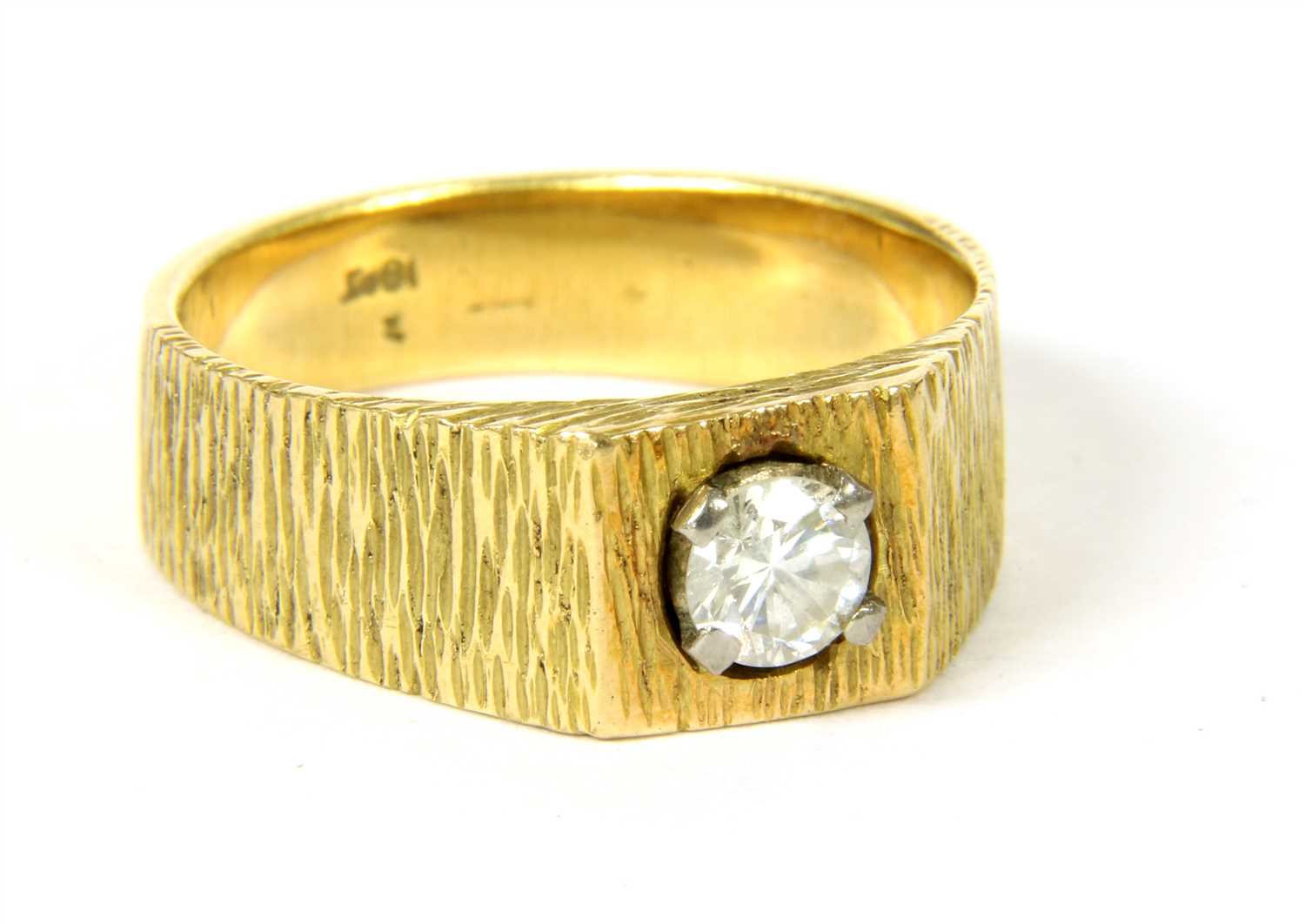 Lot 11 - A gold square head single stone diamond ring