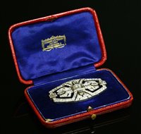 Lot 187 - A cased Austrian Art Deco diamond set plaque brooch