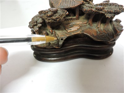 Lot 261 - A bamboo carving and a water dropper