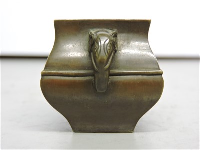 Lot 185 - A Chinese bronze water dropper and ladle