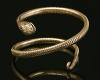 Lot 208 - A 9ct gold snake form bangle