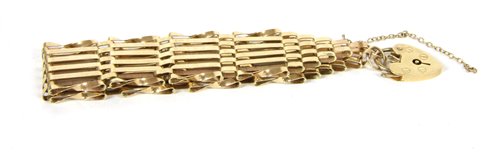 Lot 162 - A 9ct gold six row gate link bracelet