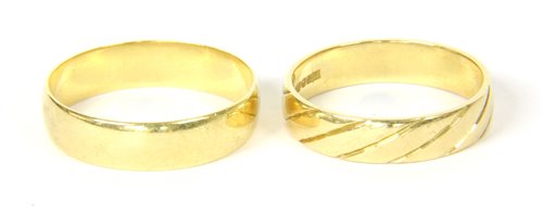 Lot 10 - Two 18ct gold wedding rings