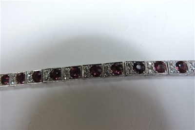 Lot 178 - An Art Deco ruby and diamond line bracelet