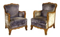 Lot 780 - A pair of French beechwood armchairs