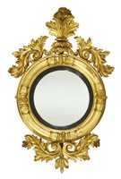Lot 25 - A Regency giltwood convex wall mirror