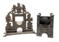 Lot 236 - Two miniature cast iron fireplaces