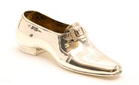 Lot 182 - A novelty silver shoe