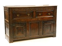 Lot 697 - An oak chest