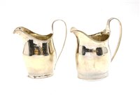 Lot 181 - Two silver milk jugs