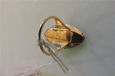 Lot 9 - A Georgian gold and enamel memorial ring