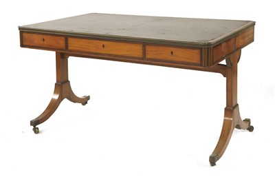 Lot 654 - A satinwood and rosewood library table