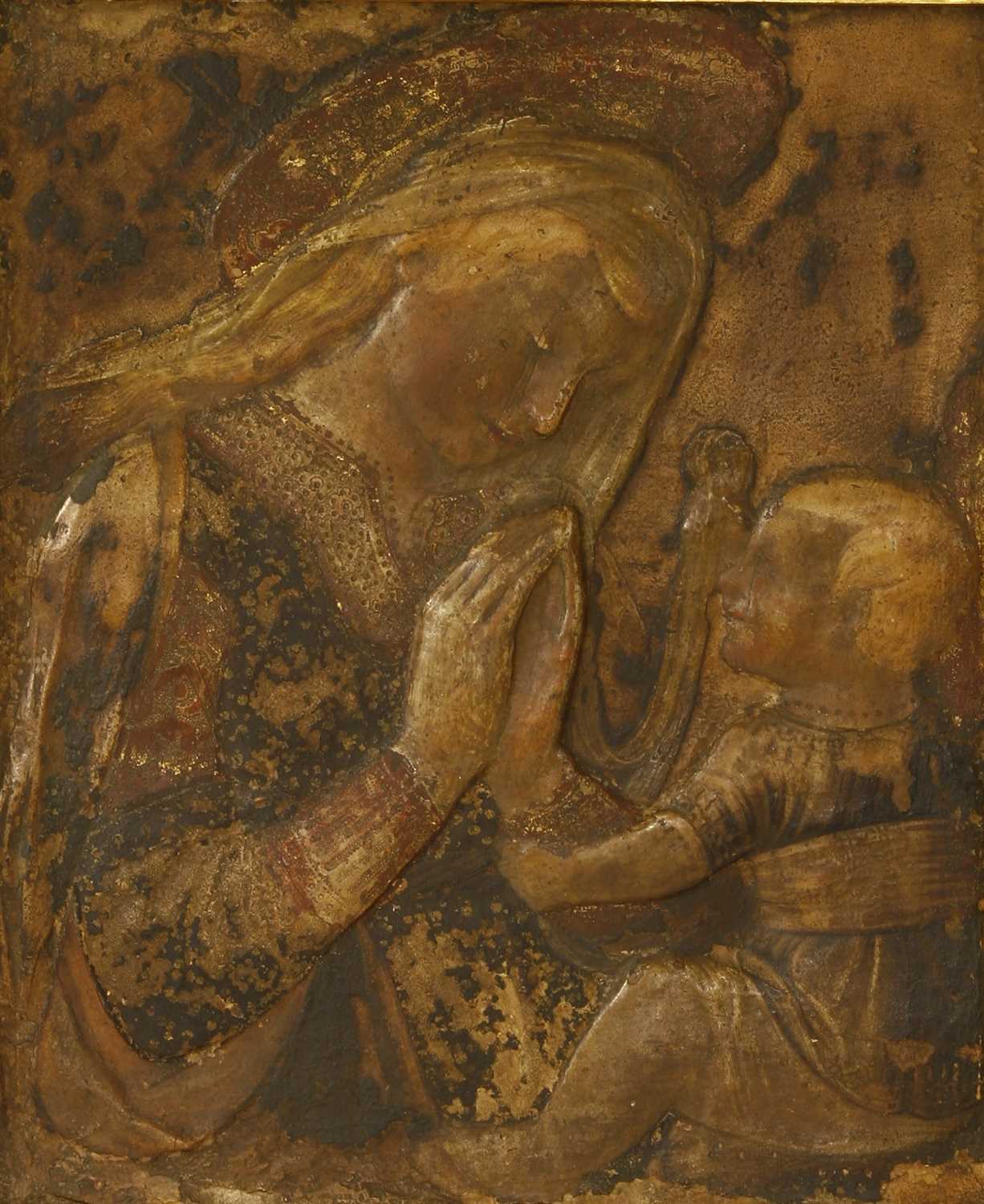 Lot 187 - A stucco panel of the Madonna and Child