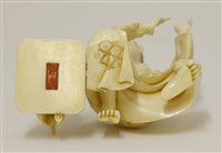 Lot 346 - A Japanese ivory okimono