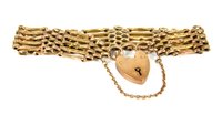 Lot 40 - A 9ct gold five row gate link bracelet with padlock