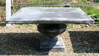 Lot 1127 - A large composite garden table