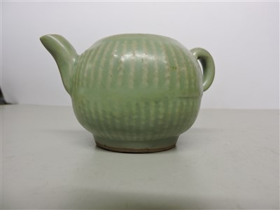 Lot 25 - A Chinese Longquan celadon teapot