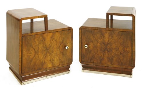 Lot 167 - A pair of Art Deco walnut bedside chests