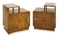 Lot 167 - A pair of Art Deco walnut bedside chests