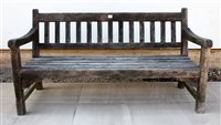 Lot 1075 - A teak garden bench