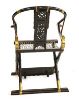 Lot 343 - A Chinese folding armchair