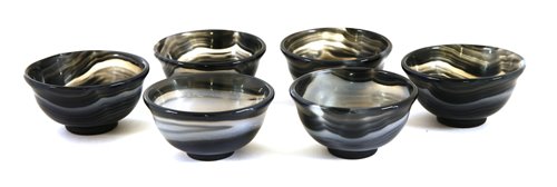 Lot 409 - A collection of six Chinese agate tea bowls