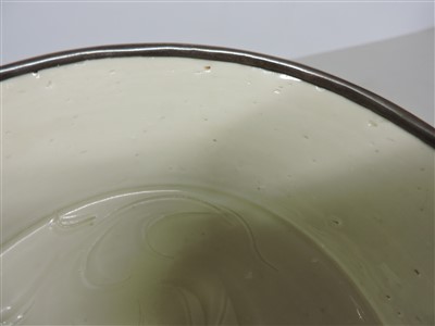 Lot 26 - A Chinese Ding ware bowl