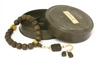 Lot 268 - A Chinese wooden bead rosary