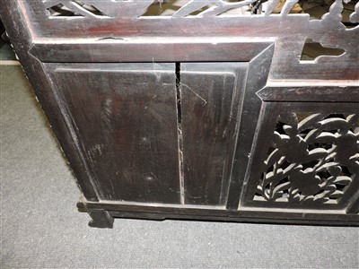 Lot 313 - A Chinese blackwood display cabinet