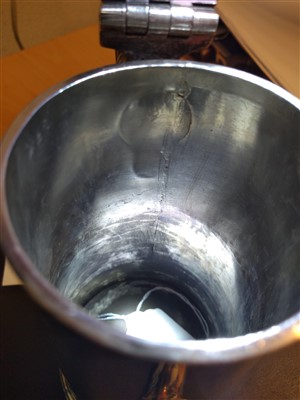 Lot 22 - A George II silver coffee pot
