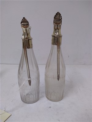 Lot 137 - A pair of George III Irish silver-topped cruet bottles