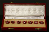 Lot 146 - A cased set of gold diamond set buttons