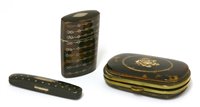 Lot 721 - A Georgian piqué work tortoiseshell and silver inlaid vesta case