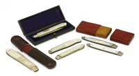 Lot 703 - A collection of silver and mother-of-pearl fruit knives