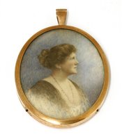 Lot 706 - A painted miniature of an Edwardian lady set in an enamel picture frame pendant