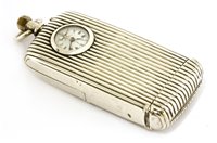 Lot 691 - A sterling silver travelling clock vesta case