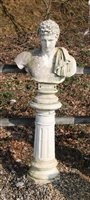 Lot 1093 - A white painted reconstituted stone bust of Caeser on fluted column