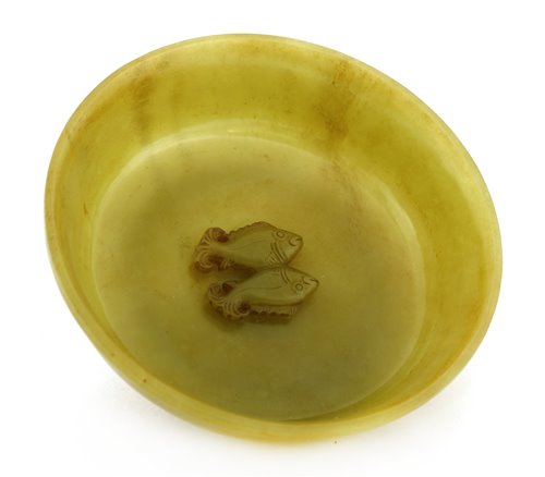Lot 167 - A Chinese jade 'twin-fish' dish