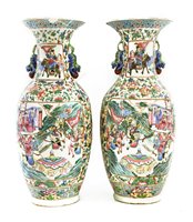 Lot 84 - A pair of Chinese Canton famille rose vases
