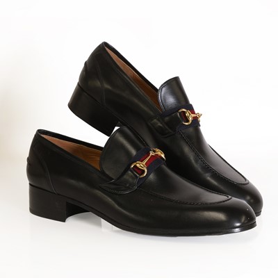 Lot 1488 - A pair of men's Gucci black leather loafers