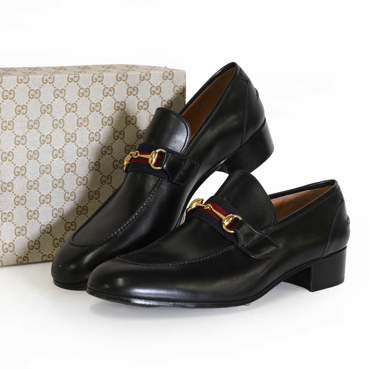 Lot 1488 - A pair of men's Gucci black leather loafers