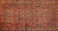 Lot 615 - A large Persian rug